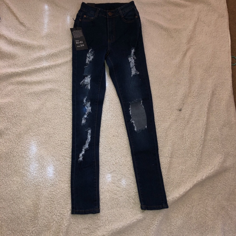 Ripped jeans new size 3-5 never worn